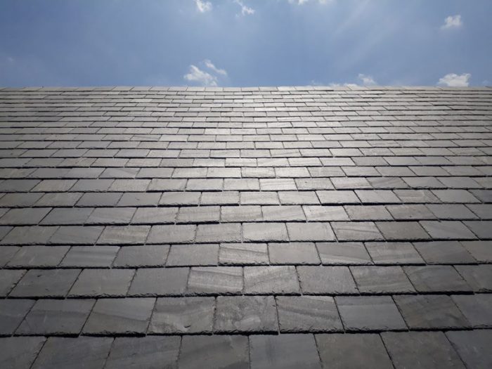 View across a natural slate roof showing natural variations on texture